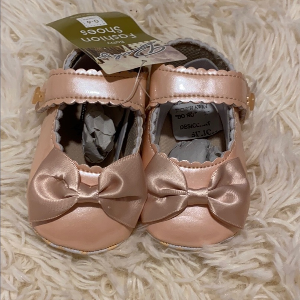 Light pink baby shoes